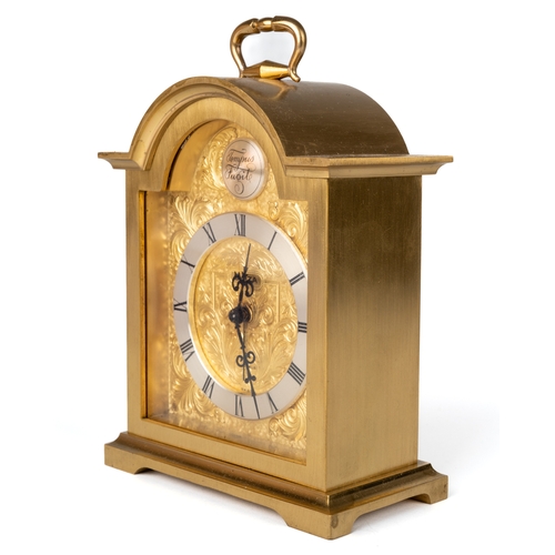 697 - A Swiza mantle clock, 15 Jewel, solid brass. Approx. 16 cm tall.