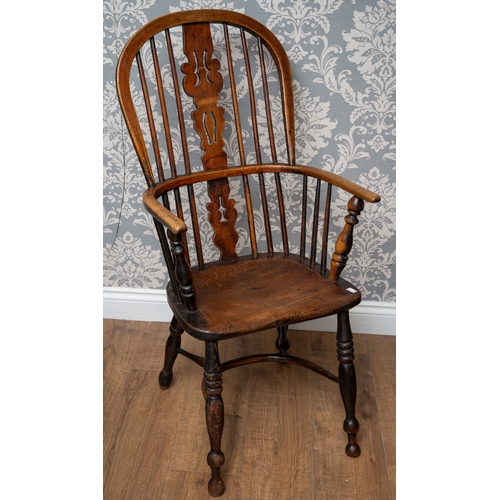 704 - Late 18th/early 19th century oak Windsor chair with Elm seat, the shaped back with spindles and pier... 