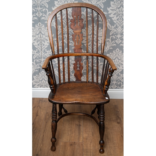 704 - Late 18th/early 19th century oak Windsor chair with Elm seat, the shaped back with spindles and pier... 