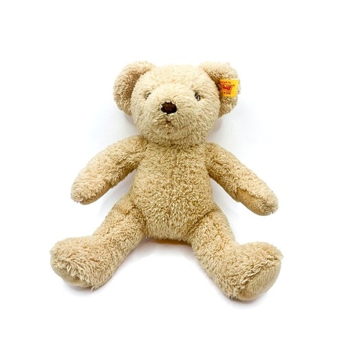 258 - A modern Steiff blonde bear, 'My First Steiff' embroidered to foot, button and label to ear.