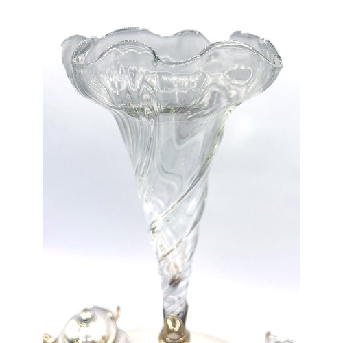 212 - A Victorian Britannia metal ink standish, cherub centrepiece supporting a writhen glass vase, two ap... 