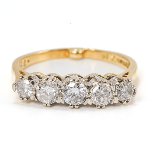 11 - An 18ct yellow gold and diamond five stone ring, set with round brilliant cut diamonds, ring size M1... 