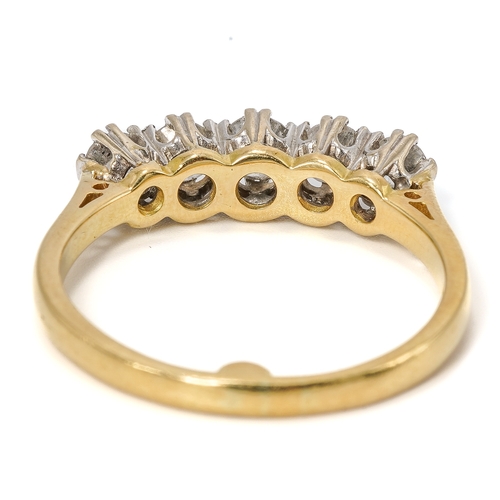 11 - An 18ct yellow gold and diamond five stone ring, set with round brilliant cut diamonds, ring size M1... 