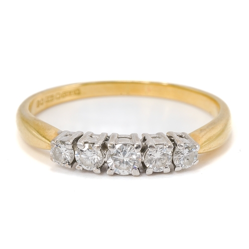 14 - An 18ct yellow gold and diamond five stone ring, set with graduated round brilliant cut diamonds, ri... 