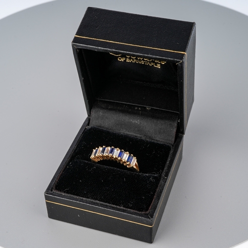 33 - A 9ct yellow gold ring, set with alternating blue and white stones possibly spinel, size O, total gr... 