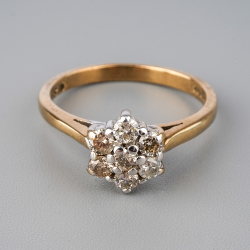 42 - A 9ct yellow gold and diamond flower head ring, size N, total gross weight approx 2.7g