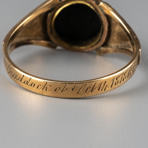 55 - A mid-Victorian 9ct yellow gold, black enamel and pearl mourning ring, the round head set with four ... 