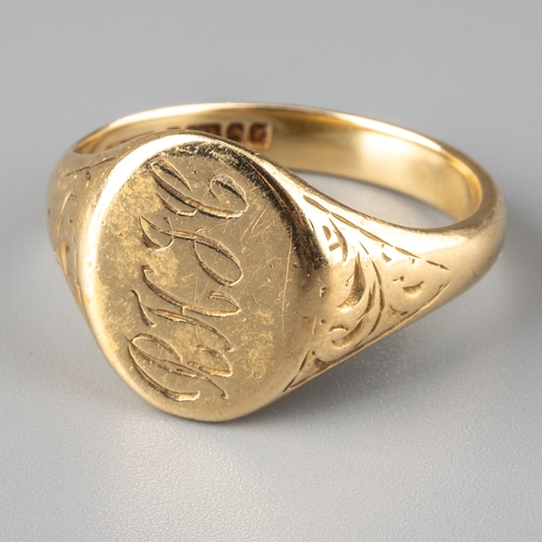 57 - A 9ct yellow gold gentleman's signet ring, oval monogrammed head with chased foliate shoulders, ring... 