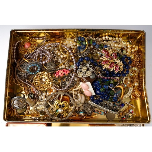 62 - A large quantity of costume jewellery including a Butler and Wilson style swan brooch; Hollywood bro... 