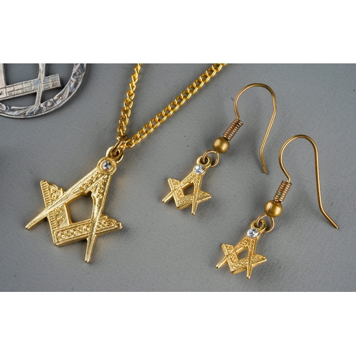 67 - Masonic Interest - a 9ct gold pendant on chain, gross weight approx 6.3g; gold plated pendants on ch... 