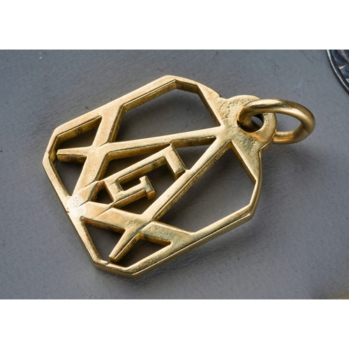 67 - Masonic Interest - a 9ct gold pendant on chain, gross weight approx 6.3g; gold plated pendants on ch... 