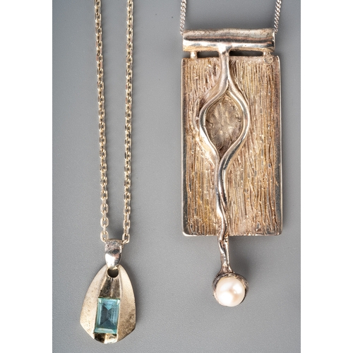 70 - An Australian silver abstract pendant set with a cultured pearl, approx 28cm long; together with a s... 