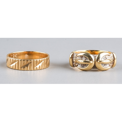 74 - A 9ct yellow gold buckle ring, size N1/2, approx 5.4g; and another 9ct yellow gold ring (split), app... 