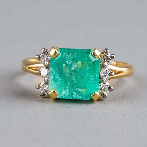 75 - An 18ct yellow gold emerald and diamond ring, set with a square-cut emerald approx 8.38mm x 8.31mm x... 