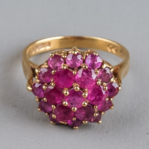 76 - A 9ct yellow gold and pink sapphire cluster ring, set with round-cut stones, ring size N1/2, total g... 