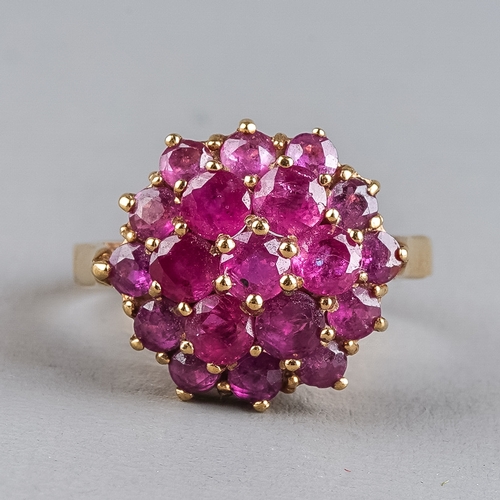 76 - A 9ct yellow gold and pink sapphire cluster ring, set with round-cut stones, ring size N1/2, total g... 