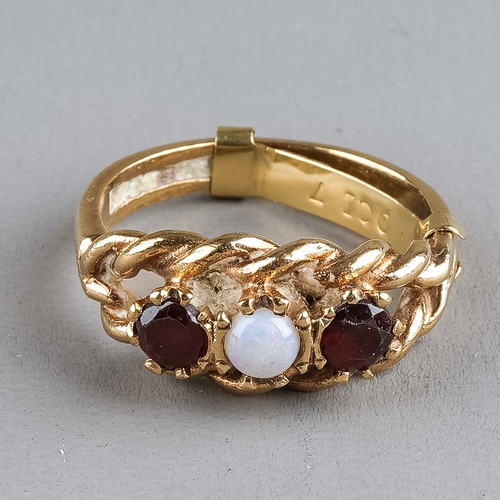 77 - A 9ct yellow gold opal and garnet ring, set with one round cabochon opal flanked by two round-cut ga... 