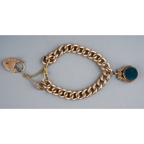 85 - A 9ct gold curb link bracelet, suspending a 9ct gold swivel fob, set with bloodstone and carnelian, ... 