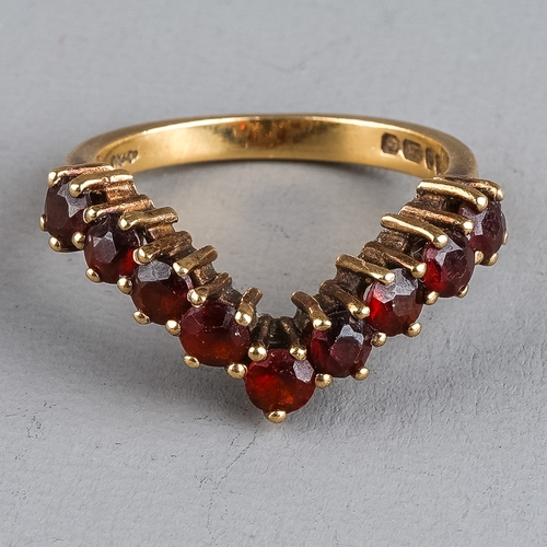 95 - A 9ct yellow gold and garnet three stone ring, size I, approx 3.1g; a 9ct gold and garnet wishbone r... 