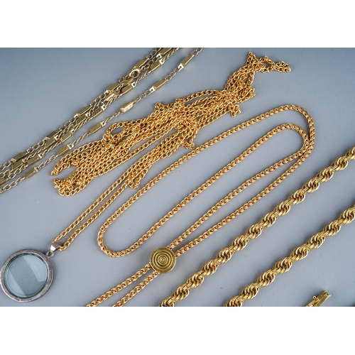 96 - A collection of costume jewellery including Monet  gold plated tassel necklace; another gold plated ... 