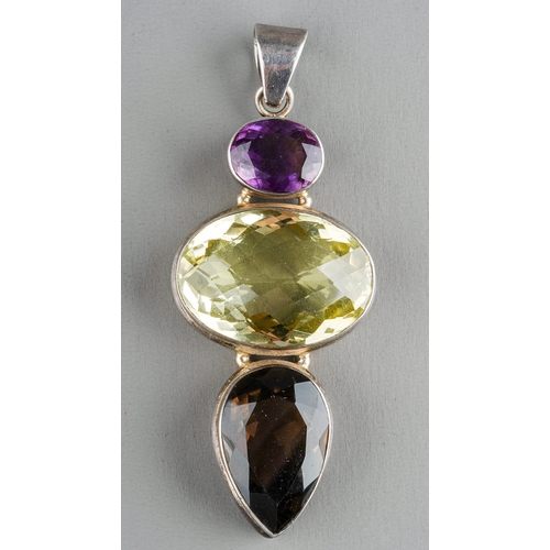 103 - A large silver pendant, set with amethyst, citrine and smoky quartz, approx 7.5cm, gross weight appr... 