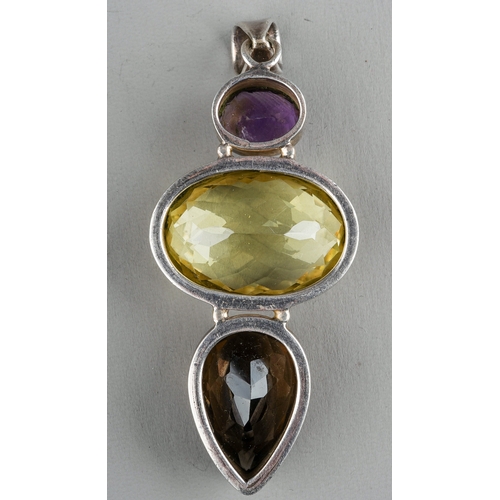 103 - A large silver pendant, set with amethyst, citrine and smoky quartz, approx 7.5cm, gross weight appr... 