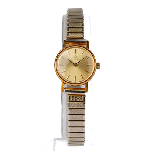 115 - A ladies Omega gold-plated wristwatch, with expanding strap