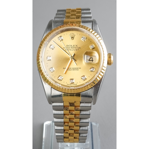 121 - A Rolex Oyster Perpetual Datejust Superlative Chronometer wristwatch, the 30mm circular gold dial wi... 