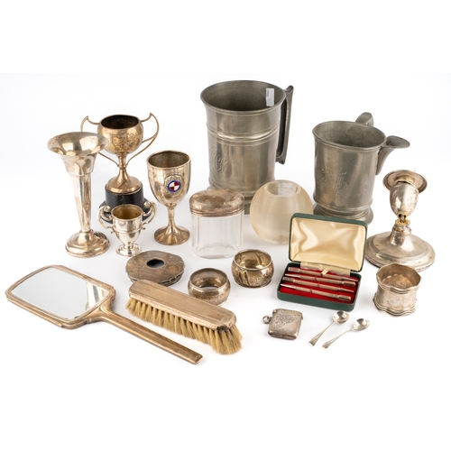 129 - A collection of silver, including napkin rings, dressing table brush and mirror, etc, a set of four ... 