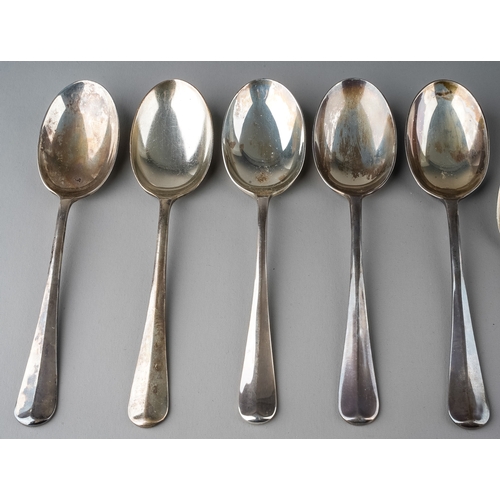 145 - A collection of silver to include: five Modern silver Hanoverian table spoons with six matching teas... 