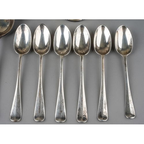 145 - A collection of silver to include: five Modern silver Hanoverian table spoons with six matching teas... 