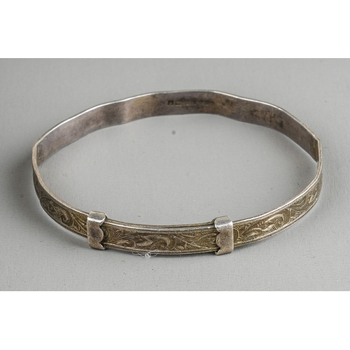 151 - A group of early 20th Century silver to include two cigarette cases, a child's bangle and a Georgian... 