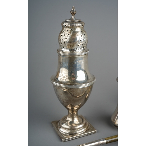 156 - A collection of silver to include: Georgian style baluster caster, hallmarked Birmingham, 1920; an o... 