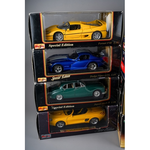 158 - Ten large scale diecast 1:18 scale car models by Maisto and Burago, all boxed to include: 
MAISTRO -... 