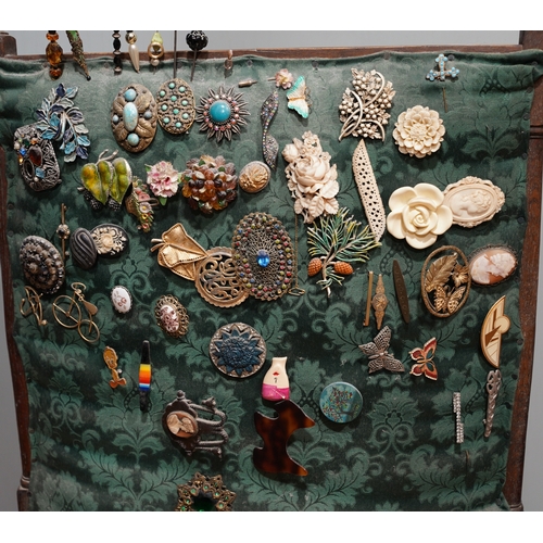 160 - A collection of brooches and hat pins, including a David Anderson silver and enamel golden leaf broo... 