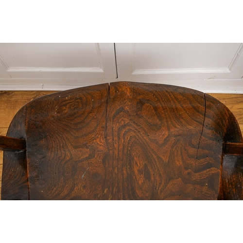 168 - A late 19th Century oak captain's chair, with pierced splat, spindle back, shaped seat and turned fr... 