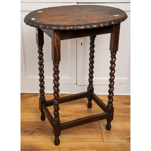 169 - A group of furniture to include: an early 20th Century oak occasional table with book rack, barley t... 