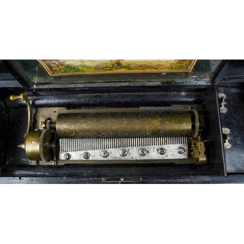 180 - A 19th Century Swiss cylinder music box plays ten tunes, the cover inlaid with flowers, the interior... 