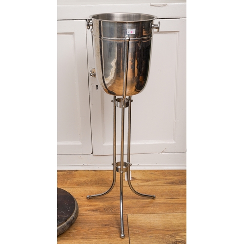 194 - A Collector's lot, to include cast meat hook, a champagne /ice bucket on stand and wooden torchere s... 