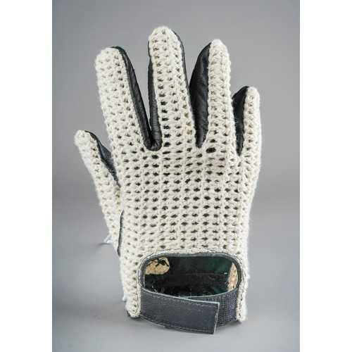 204 - Motor racing interest - 1950s style (replica) leather and webbed racing glove, signed in silver pen ... 