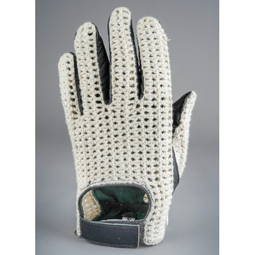 205 - Motor racing interest - 1950s style (replica) leather and webbed racing glove, signed in silver pen ... 