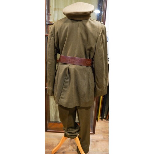 228 - A post 1953 Royal Engineers uniform comprising: trousers, jacket, shirt, cap badges and Sam Brown be... 