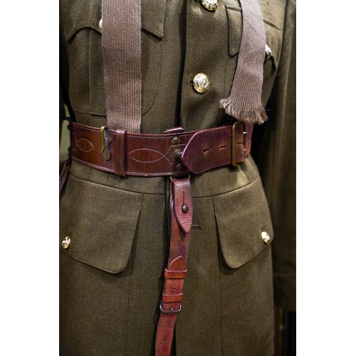 228 - A post 1953 Royal Engineers uniform comprising: trousers, jacket, shirt, cap badges and Sam Brown be... 