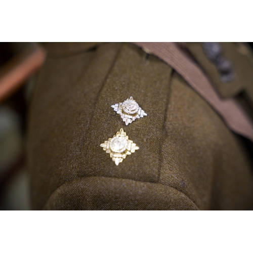 228 - A post 1953 Royal Engineers uniform comprising: trousers, jacket, shirt, cap badges and Sam Brown be... 