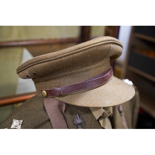 228 - A post 1953 Royal Engineers uniform comprising: trousers, jacket, shirt, cap badges and Sam Brown be... 