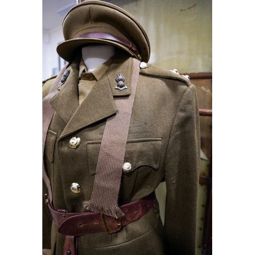 228 - A post 1953 Royal Engineers uniform comprising: trousers, jacket, shirt, cap badges and Sam Brown be... 