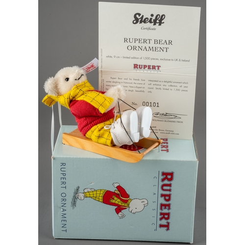 246 - Collection of Steiff to include: Hannes 32cm bear; a boxed Rupert Bear on sleigh ornament and two sm... 