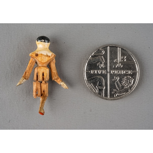 247 - A 19th Century Peg Doll, in fitted case, approx 2.5cm long