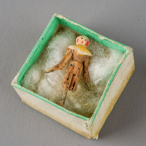 247 - A 19th Century Peg Doll, in fitted case, approx 2.5cm long