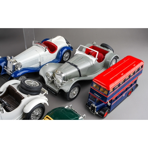 258 - A collection of model vehicles, including Burago, Corgi, etc, cars, buses, transporters